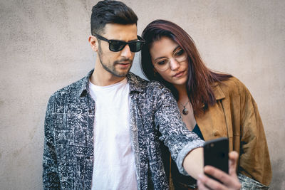 Young man using smart phone