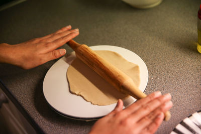 High angle view of person preparing food