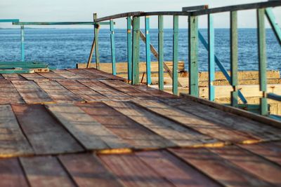 Pier over sea against sky