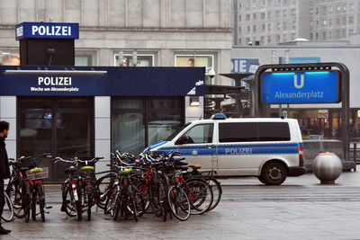 Bicycles parked on street in city