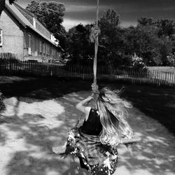 Man on tree against sky