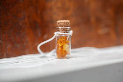 Close-up of glass of jar on table