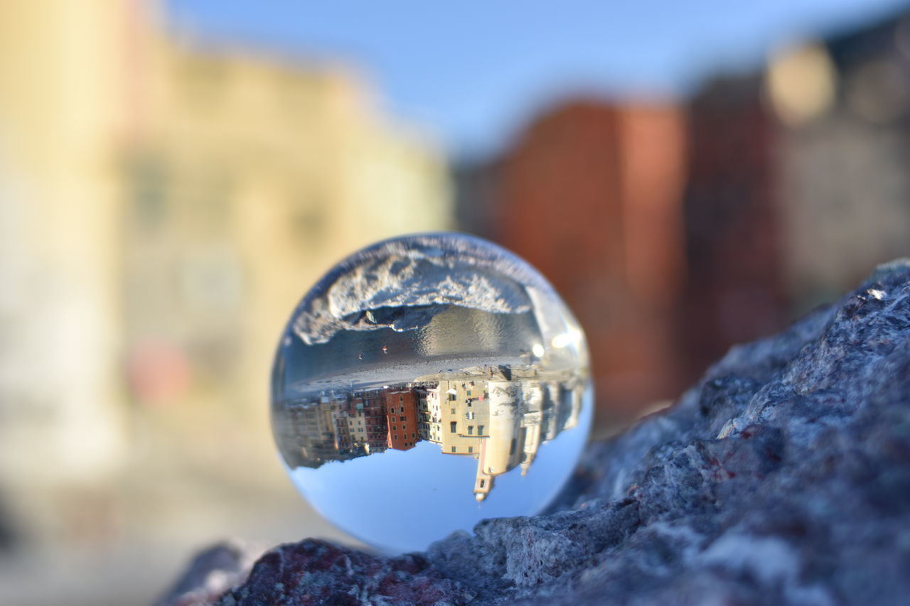 CLOSE-UP OF SNOW COVERED ROCK