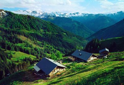 Scenic view of landscape and mountains against sky