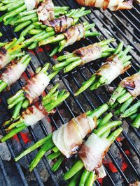 High angle view of meat on barbecue grill