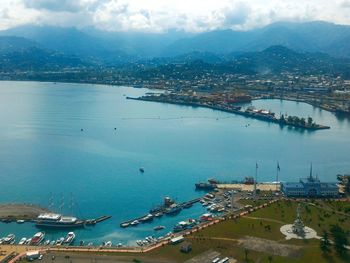 High angle view of harbor and buildings in city