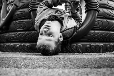 Surface level of boy lying on floor