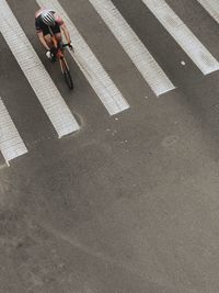 High angle view of people walking on street