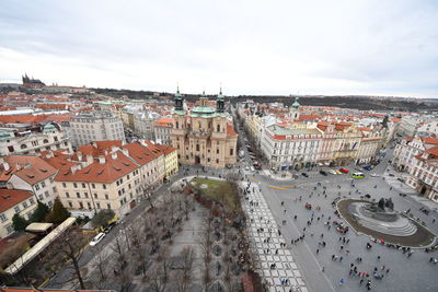 High angle view of buildings in city against sky