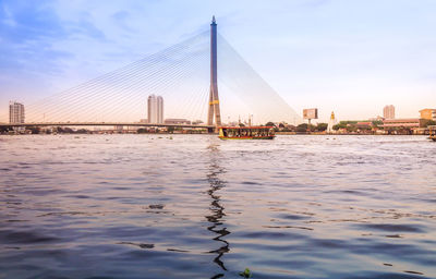 View of suspension bridge over river