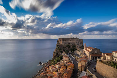 Panoramic view of scilla - calabria with castle ruffo and sea - clouds in background