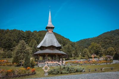 Temple against clear blue sky