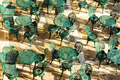 Table and chairs in tiled floor