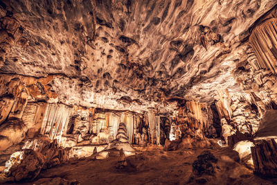 High angle view of man standing in cave