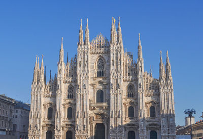 Low angle view of cathedral against clear blue sky