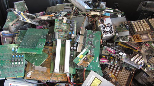 High angle view of damaged computer circuits heap