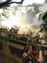 Man in waterfall