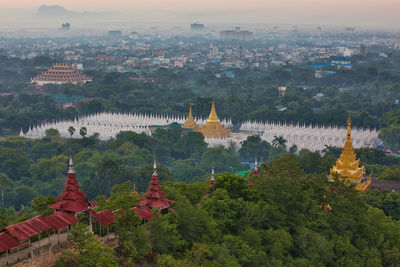 Panoramic view of trees and buildings in city