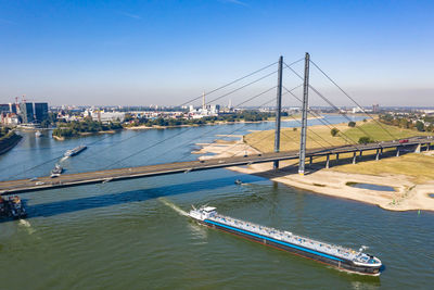 Bridge over the river rhine rheinkniebrücke in düsseldorf from a bird's eye view, drone photography