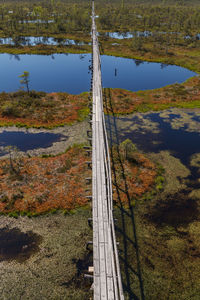 High angle view of road by lake during autumn