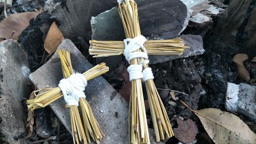 High angle view of cross on rock at temple