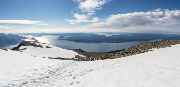 Idyllic shot of lake against sky seen from mountain