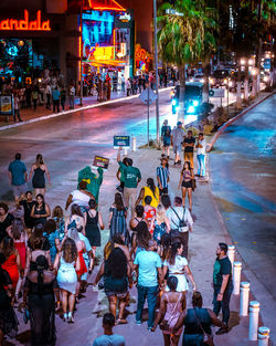 Group of people on road at night