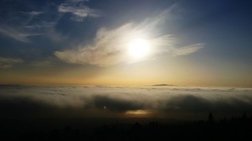 Scenic view of sea against sky at sunset