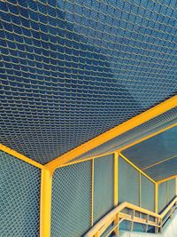 Staircase covered by metallic net