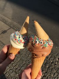 Midsection of woman holding ice cream