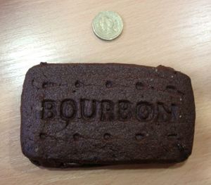 Close-up of text on wooden wall