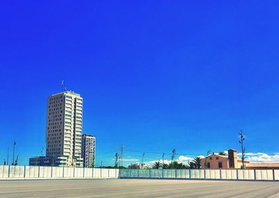 Modern building against clear blue sky