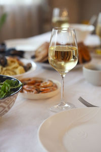 Close-up of wineglass on table in restaurant