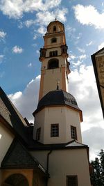 Low angle view of clock tower against sky