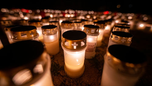 Close-up of lit tea light candles