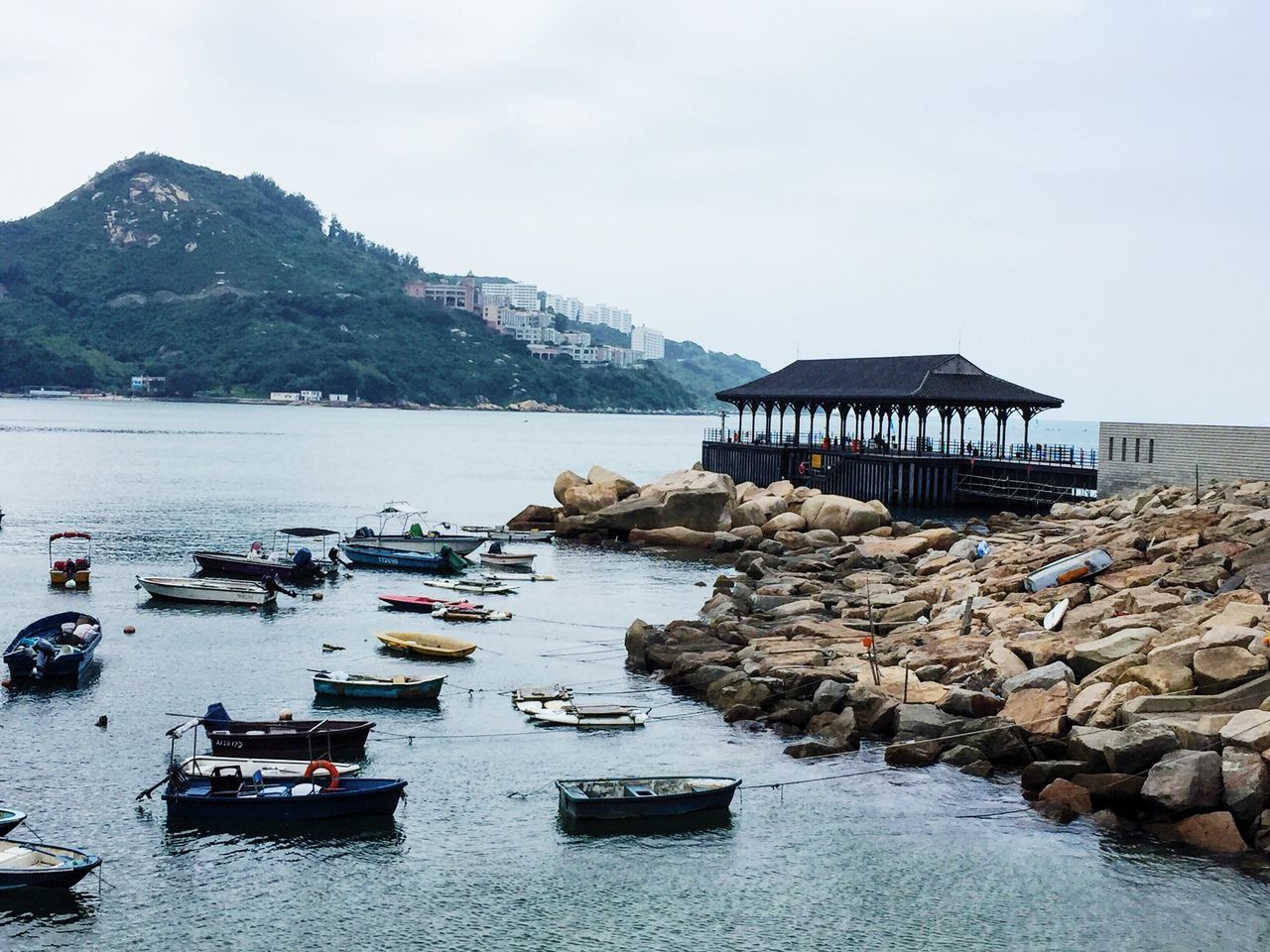 Pier waters edge stanleyhongkong boats overcast day water jetty