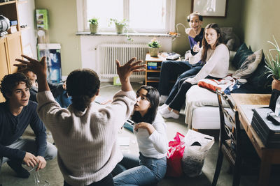 Group of people sitting on table