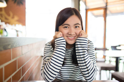 Portrait of a smiling young woman