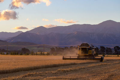 Scenic view of field against mountains