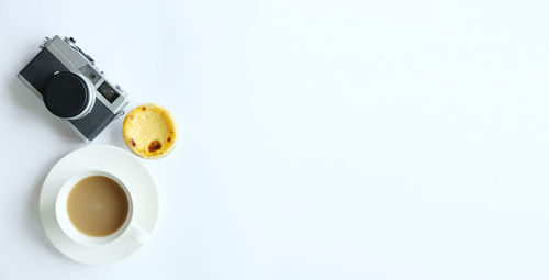 Directly above shot of coffee cup on table