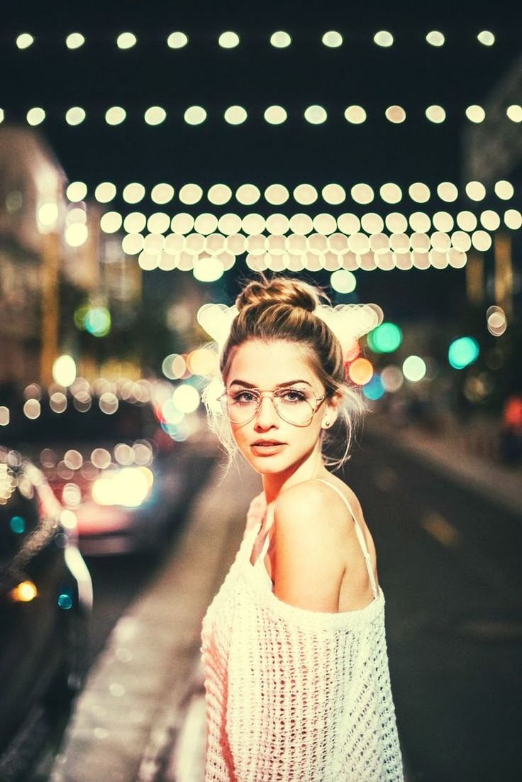 portrait, one person, looking at camera, lifestyles, focus on foreground, young adult, illuminated, real people, women, leisure activity, adult, beautiful woman, young women, beauty, smiling, transportation, night, standing, hairstyle