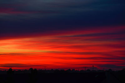 Scenic view of dramatic sky during sunset