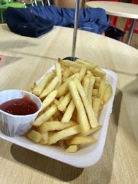 High angle view of burger and fries on table