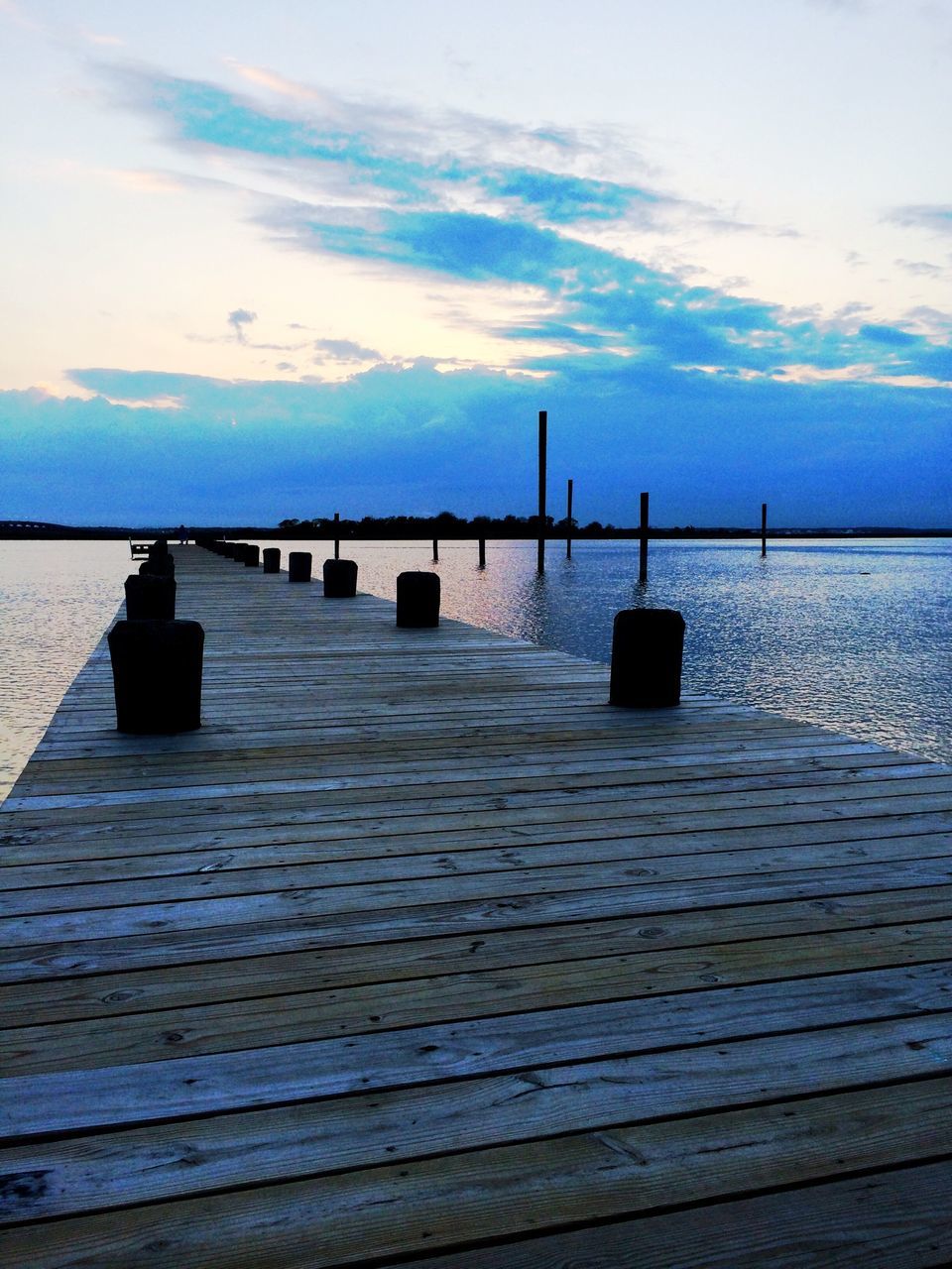 water, sea, pier, sky, tranquil scene, tranquility, wood - material, horizon over water, scenics, jetty, beauty in nature, nature, railing, cloud - sky, wood, idyllic, cloud, the way forward, rippled, calm