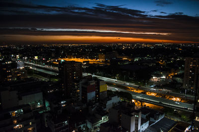 High angle view of illuminated city at night