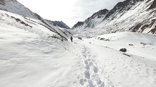 Snow covered mountain against sky