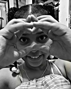 Close-up portrait of smiling young woman