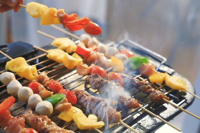 Close-up of food on barbecue grill