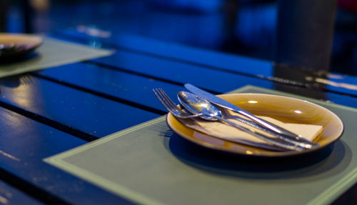 High angle view of glasses on table in restaurant