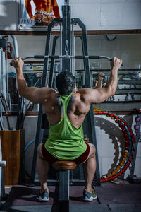 Man exercising in gym